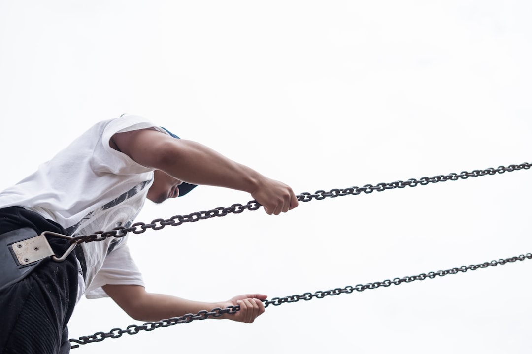 A bright, powerful image of a real estate agent breaking chains, symbolizing their financial liberation from the traditional, high-cost brokerage model.