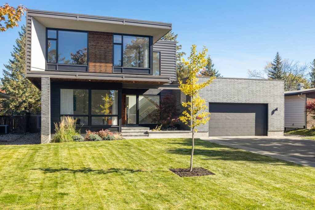 Clean, bright architectural lines of a modern luxury home, representing a new and better real estate business model.